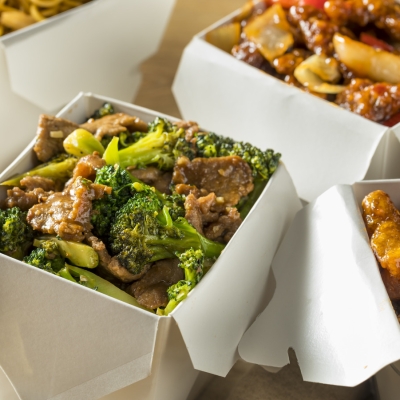 Spicy Chinese Take Out Food with Chopsticks and Fortune Cookies